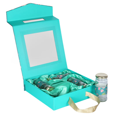 Floral Delight Hamper with 4 Cylinder jars - Color: Teal Sea, Size: 10.5*10.5*2.5 Inches, Material: Kappa Board from Nice Packaging.

