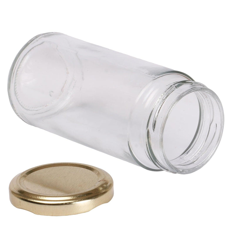 Empty glass jars with golden caps